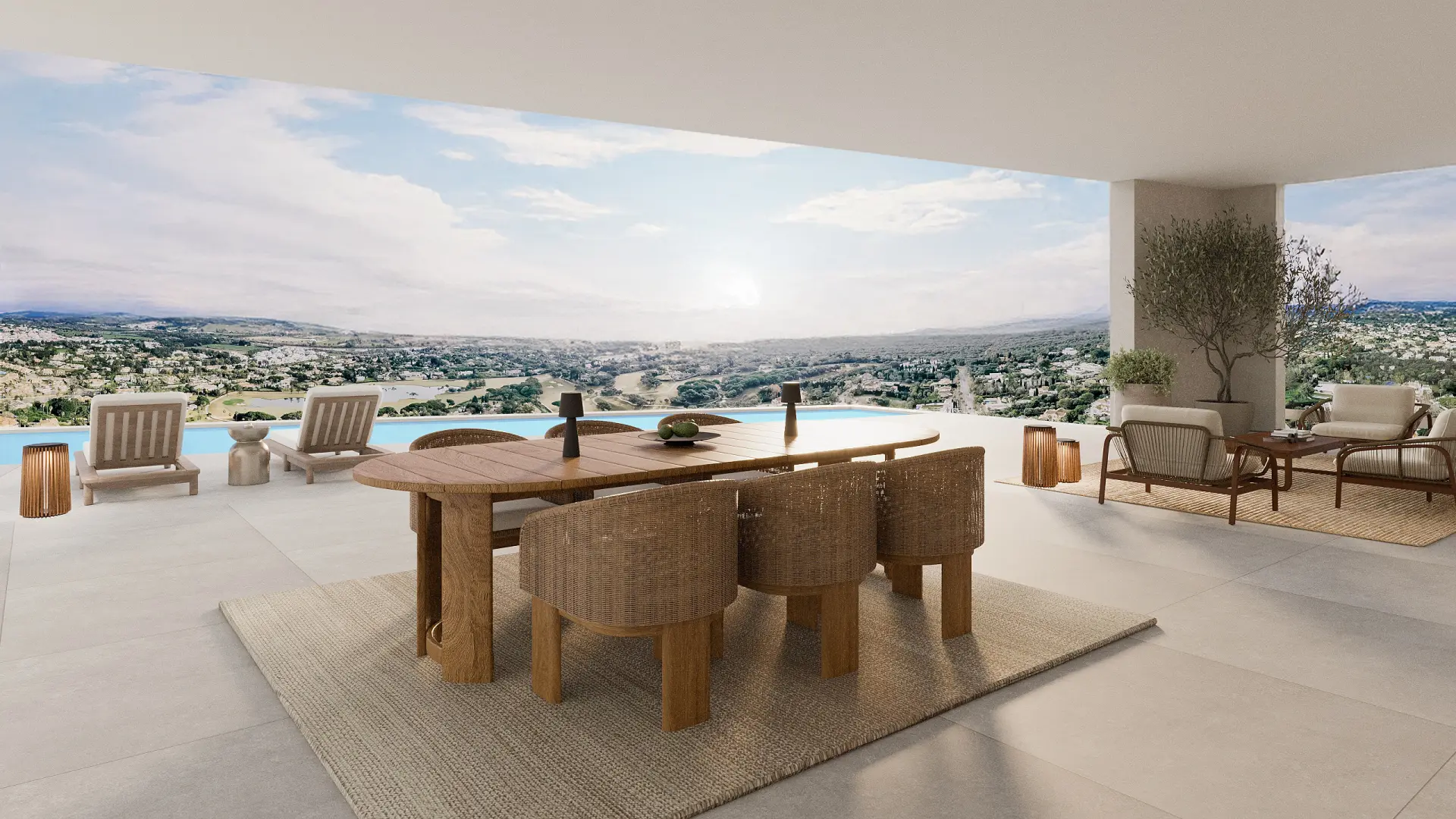 Modern terrace in Sotogrande with outdoor dining area, infinity pool, and panoramic views over golf valley and landscape