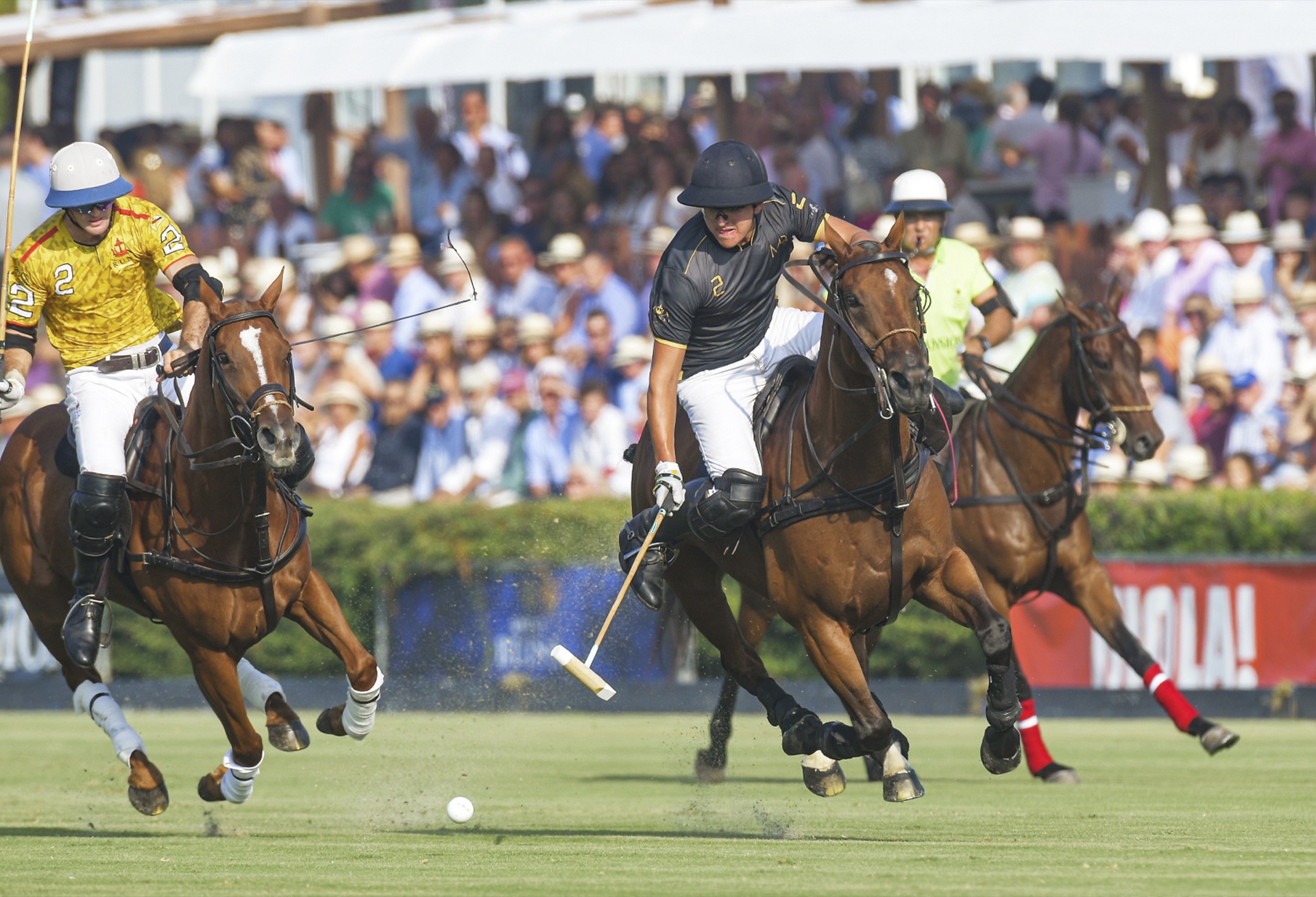 Polo match in Sotogrande with players on horseback during a game