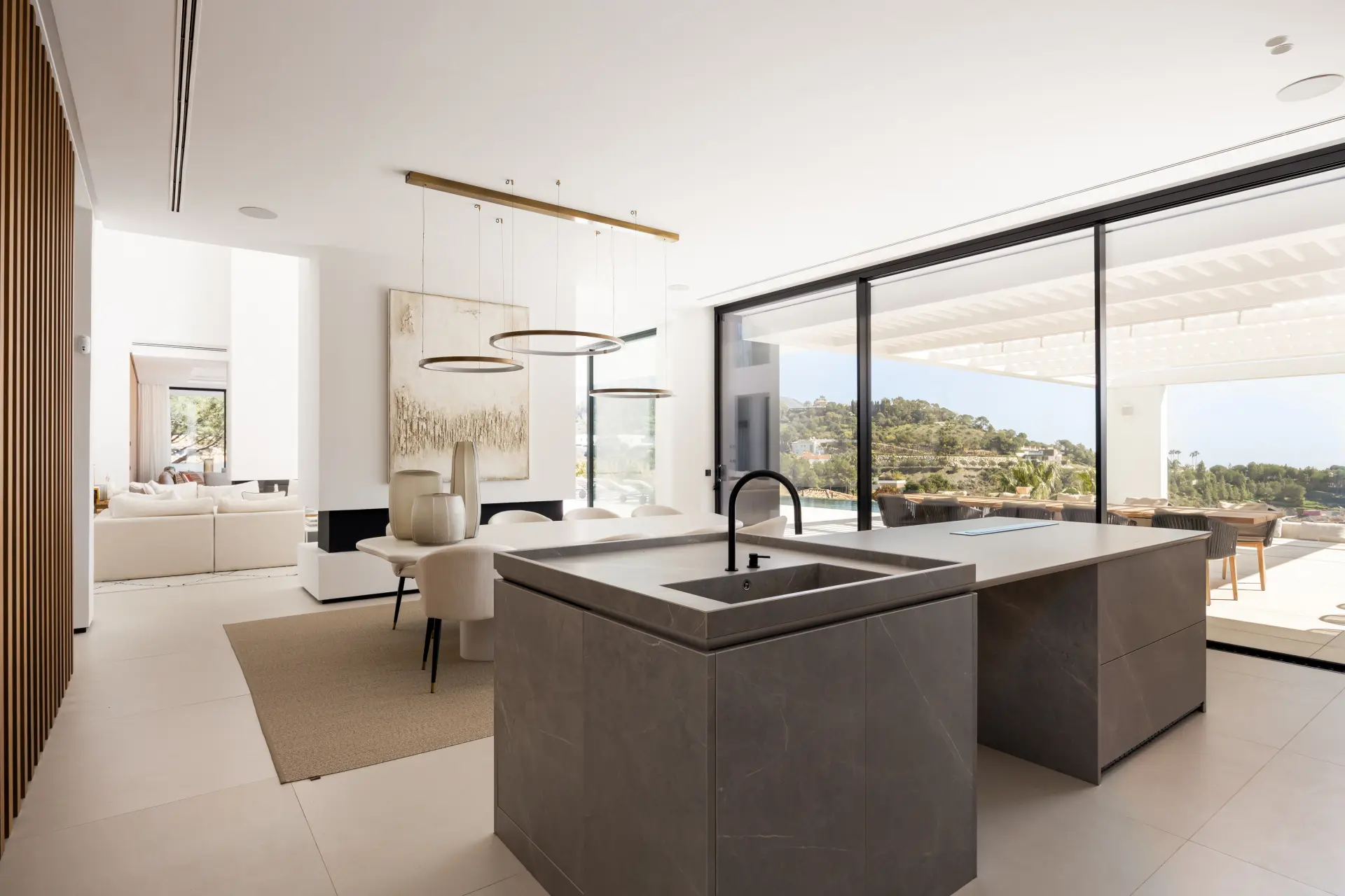 Interior of a luxury Marbella property showing refined materials, generous proportions and a calm contemporary design
