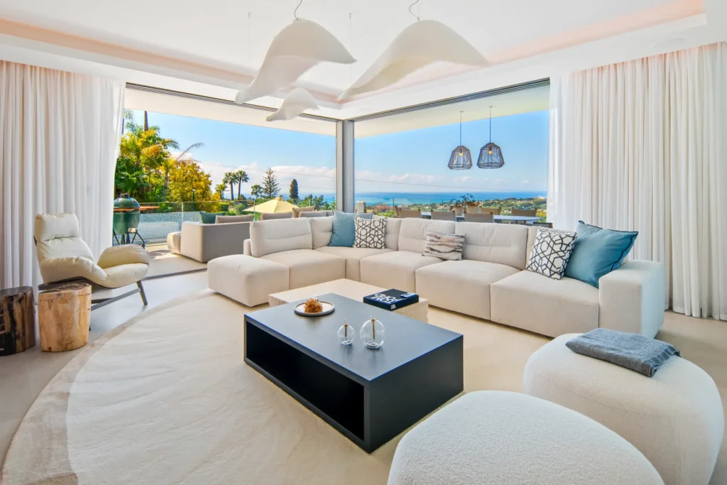Bright Marbella home interior with terrace and sea views after property completion in Spain