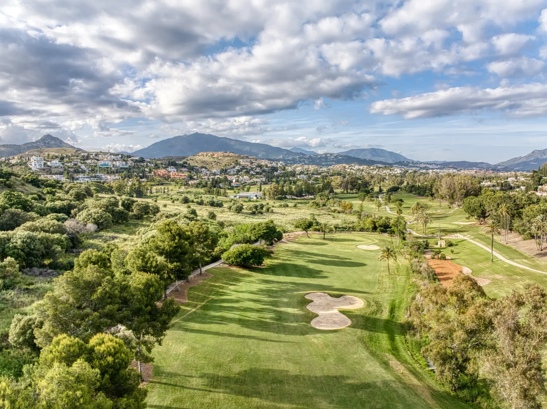 El Paraíso Golf Club in Estepona with fairways, mature trees, and mountain views