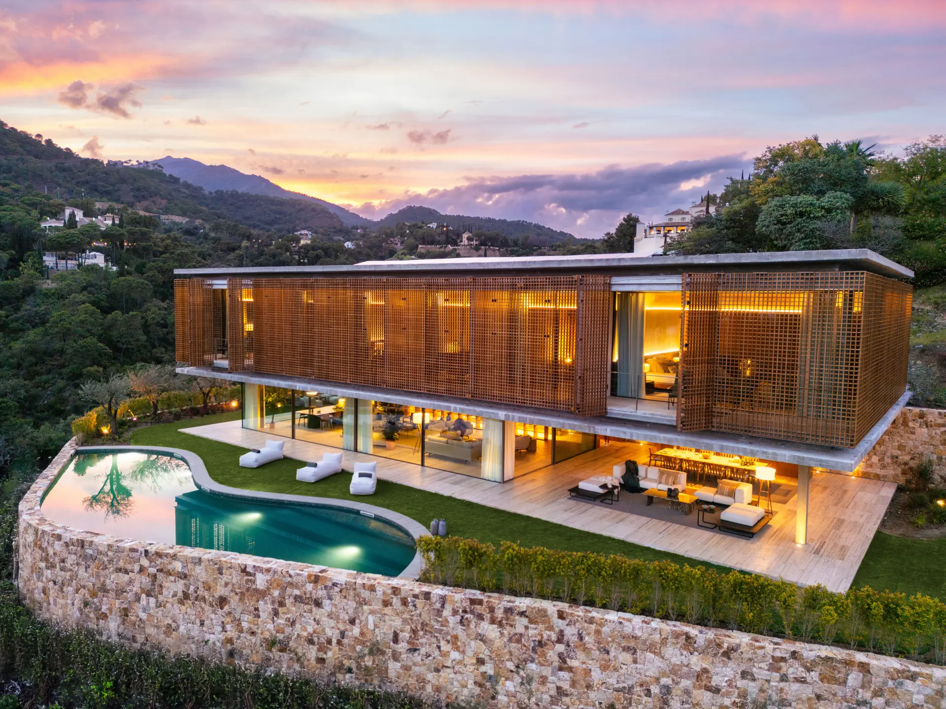 Villa Alia in El Madroñal with contemporary architecture, landscaped outdoor spaces and Mediterranean views