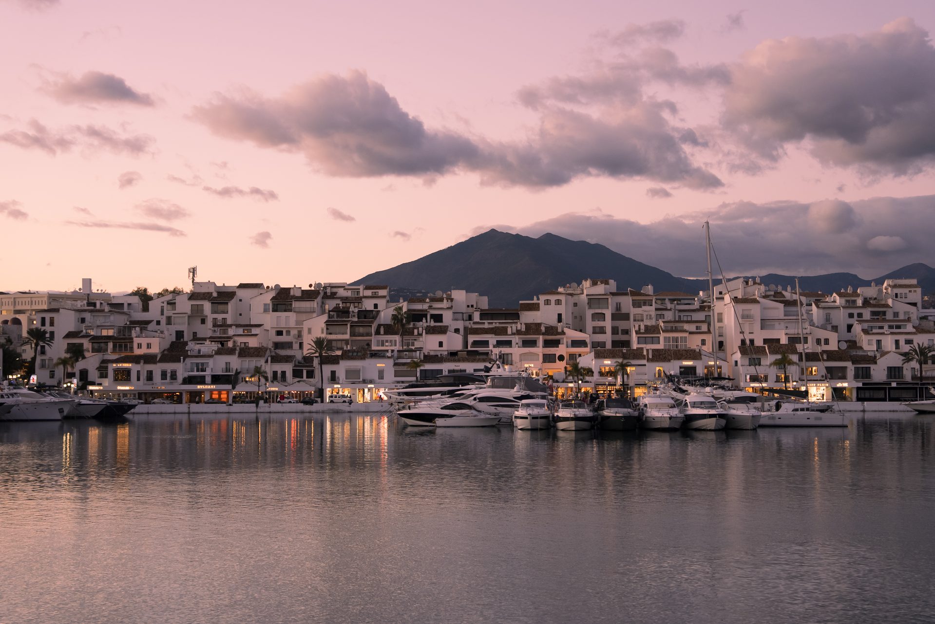 Autumn in Marbella with Puerto Banús marina, mountain views and a calm evening atmosphere